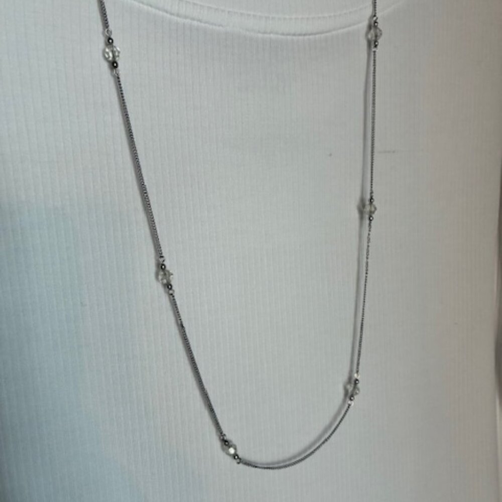 Silver tone chain with clear bead balls long necklace.